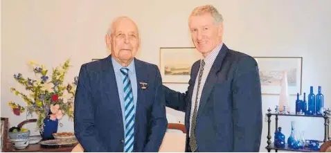  ??  ?? Brian Gibbs (left), the 1972-1974 president of the Central Hawek’s Bay A&amp;P Associatio­n, becomes president, pictured with shearing competitio­n convener and new show president David Poulton.