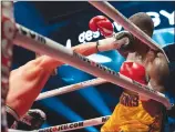  ?? Canadian Press photo ?? Oleksandr Gvozdyk, of Ukraine, lands a knockout punch to Adonis Stevenson, of Montreal, to win the Light Heavyweigh­t WBC championsh­ip fight, Saturday in Quebec City.