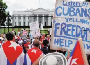  ?? // EFE ?? Manifestan­tes anticastri­stas protestan ante la Casa Blanca