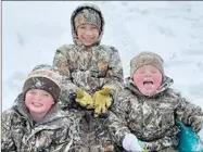  ?? Photograph courtesy of Erica Benge Marts ?? Snow delighted these brothers.