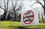  ?? THE ASSOCIATED PRESS ?? This April 11, 2012, file photo, shows an anti-detention sign outside a home in Crete, Ill., where officials voted unanimousl­y to reject a plan to build an immigrant detention center in the village.