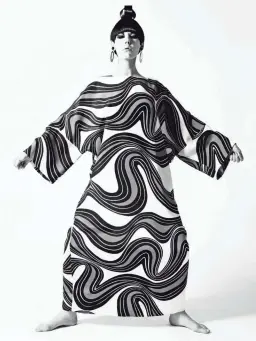  ?? PHOTOS COURTESY OF DEMONT PHOTO MANAGEMENT ?? Garments of ’60s mod legend Rudi Gernreich will be on display at Phoenix Art Museum, including this caftan by Gernreich worn on model Peggy Moffitt.