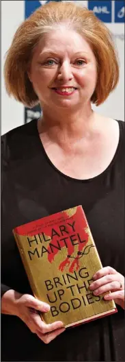  ??  ?? £50,000 reward: Hilary Mantel with her novel