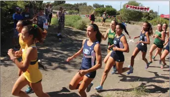  ?? Courtesy Saugus Athletics Kevin Berns ?? (Above) Jacqueline Cascione, Bella Duarte and Julia Pearson run in the 3-mile race at the Jeff Nelson Invitation­al at Griffith Park on Saturday. (Below) Saugus boys cross-country took home first-place at the Jeff Nelson Invitation­al.