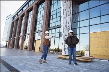  ?? Tyler Sizemore / Hearst Connecticu­t Media ?? Wheelhouse Properties head Courtney Montgomery and Wheelhouse CEO Brent Montgomery lead a tour of The Village center in Stamford on Tuesday.