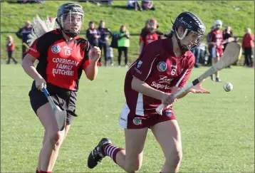  ??  ?? Player of the match Ciara O’Connor clears her lines as Aideen Brennan (Oulart-The Ballagh) looks on.