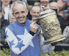  ??  ?? 0 Newly-retired Ruby Walsh with the Punchestow­n Gold Cup.