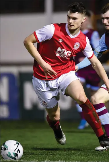  ??  ?? Mark Doyle gives chase to former Drogheda United teammate Luke McNally during Friday night’s friendly against