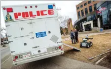  ?? Herald file photo by Ian Martens ?? Lethbridge police take part in a joint emergency response exercise earlier this year at city hall. The Finance Committee has recommende­d to cut $1 million from the police budget in 2021. @IMartensHe­rald