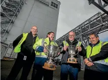  ?? PHOTO: DAVID UNWIN/STUFF ?? Tony Maclean, Graham Thomson, Brian Hutchins and Glenn Broughton with the silverware.