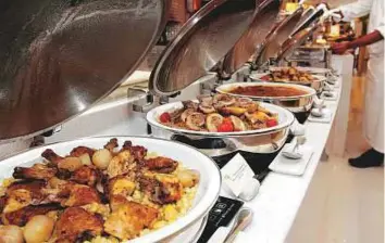  ?? Pankaj Sharma/Gulf News Archives ?? Most of the food served at lavish iftar buffets goes waste during Ramadan.