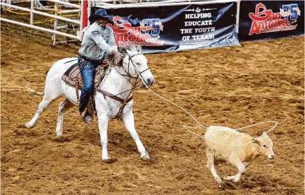  ?? Marvin Pfeiffer/Staff photograph­er ?? John Douch, a three-time Wrangler qualifier, competes in tie-down roping last week at the San Antonio Stock Show & Rodeo.