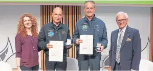  ?? Picture top: Solar Impulse. ?? Top: Solar Impulse in flight. Above: Vanessa Collingrid­ge and Professor Roger Crofts, right, of RSGS with Mr Piccard and Mr Borschberg.