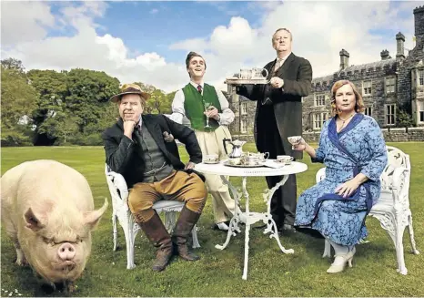  ??  ?? HAMMING IT UP: Timothy Spall and Jennifer ‘Ab Fab’ Saunders, seated, play the lead roles, along with a pig, in ‘Blandings’, an adaptation of the PG Wodehouse stories