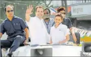  ?? PTI ?? Congress vicepresid­ent Rahul Gandhi waves during a roadshow in Gujarat’s Valsad district on Friday.