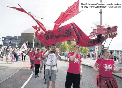  ?? PETER BOLTER ?? The Butetown Carnival parade makes its way from Cardiff Bay