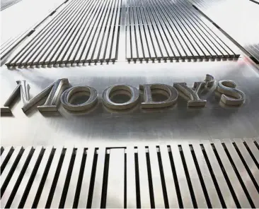  ??  ?? Weaker rating: A Moody’s sign is displayed at the company’s corporate headquarte­rs in New York. Moody’s calculates that almost 36% of US junk-rated companies are rated in B’s lowest level or are already rated C, the riskiest grouping. — Reuters