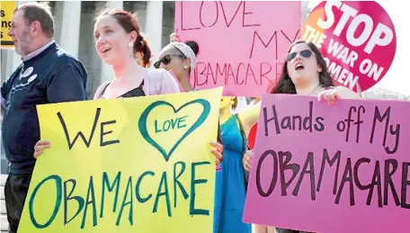  ??  ?? Protests against attempts to repeal “Obamacare”. Pic courtesy CNN