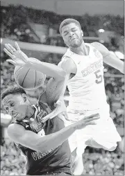  ?? ASSOCIATED PRESS ?? Kentucky’s guard Andrew Harrison (top) will be bringing his outside shooting and defensive abilities to the Grizzlies after Memphis traded Jon Leuer to the Phoenix Suns to acquire the No. 44 pick in Thursday’s draft.