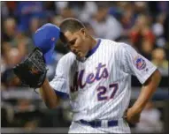  ?? KATHY WILLENS — AP FILE ?? Mets closer Jeurys Familia walks off field after giving up a three-run home run during New York’s loss in the National League wild-card game.