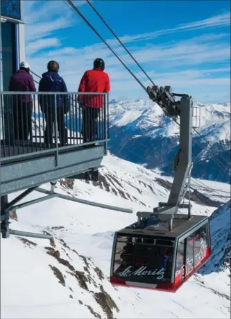  ?? TNS ?? A gondola on the way up to the top of the Corvatsch ski run. St. Moritz has special events that keep bringing back those who love it.