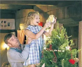  ?? Quantrell Colbert NBC ?? RICKY SCHRODER plays Dolly Parton’s dad and Alyvia Alyn Lind is good as a 9-year-old pre-superstar in “Dolly Parton’s Christmas of Many Colors” on NBC.