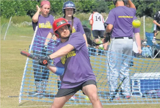  ??  ?? Richard Jameson in batting action for the Crosby Vikings at the British Softball Federation National Championsh­ips
