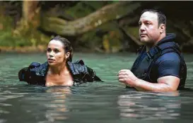  ??  ?? Zulay Henao and Kevin James star in “True Memoirs of an Internatio­nal Assassin.” The financial risk of making a Netflix original film is less, compared to a big studio film that may or may not find an audience at the box office.