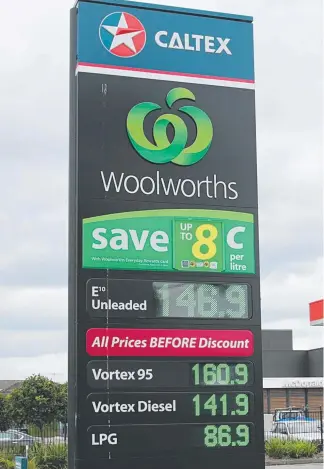  ?? Picture: AAP ?? Woolworths inked a fuel and food supply deal with Caltex Australia.