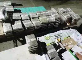  ??  ?? MARIJUANA bricks valued at ₱16 million were seized from two high-value targets in Quezon, Isabela in a buy-bust operation Saturday. (PNP photo)