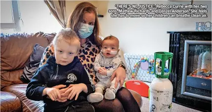  ?? ?? ‘THERE’S NO JUSTICE’: Rebecca Currie with her two sons, Mathew Richards and Denzel Anderson. She feels she has to move so her children can breathe clean air.