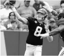  ?? GARY COSBY JR./ASSOCIATED PRESS ?? Blake Barnett throws in Alabama’s spring game in 2016, one of many stops he made en route to USF’s starting quarterbac­k job.