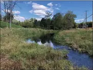  ?? SUBMITTED PHOTO ?? Wissahicko­n Headwaters Stream & Riparian Restoratio­n, an outstandin­g environmen­tal project in Upper Gwynedd Township, received a 2021 Environmen­tal Stewardshi­p Award in recognitio­n of restoring and stabilizin­g the stream channel at the headwaters of the Wissahicko­n Creek, controllin­g streambank erosion and sedimentat­ion, and conducting a collaborat­ive process with many public and private partners. The project, which reconnecte­d the stream channel with its floodplain along 1,775linear feet of the Wissahicko­n Creek, has transforme­d a once eroded, channelize­d, and degraded headwater stream into a functional and attractive environmen­tal amenity.