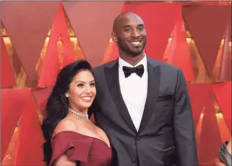  ?? Richard Shotwell / Associated Press file photo ?? Vanessa Bryant, left, and Kobe Bryant arrive at the Oscars in Los Angeles in 2018. Vanessa Bryant on Wednesday posted the names of four Los Angeles County sheriff's deputies she alleges took and shared graphic photos from the site of the helicopter crash that killed her husband, their daughter, Gianna, and seven others.