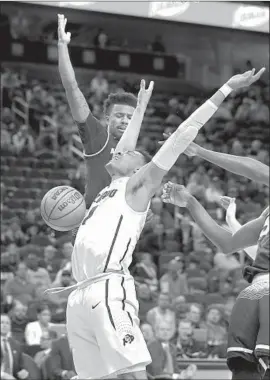  ?? Isaac Brekken Associated Press ?? COLORADO’S TYLER BEY is fouled during the second half against Arizona State. The Buffaloes advanced to face top-seeded Arizona in the quarterfin­als.