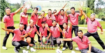  ??  ?? HISTORIC WIN ... Sabah’s SGA Cup winning team celebrate their historic win in the 17th edition of the golf tournament at SGCC yesterday.