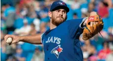  ??  ?? Blue Jays starting pitcher Joe Biagini throws against the New York Yankees during a game on Sept. 23. CP photo