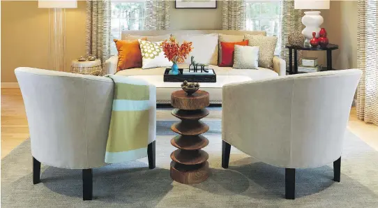 ?? RACHEL REIDER INTERIORS ?? Rachel Reider Interiors anchors this seating area with bound broadloom, giving the room a calm, sophistica­ted feel.