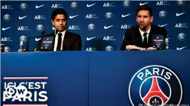  ??  ?? "Ici c'est Paris" - or is it Qatar? Lionel Messi and Nasser Al-Khelaifi at the Agentinian legend's PSG unveiling