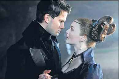  ??  ?? Fateful attraction: Jeremy Irvine and Holliday Grainger embody the pauper and the princess, Pip and Estella, in a faithful, though needless, adaptation of Charles Dickens’ Great Expectatio­ns.