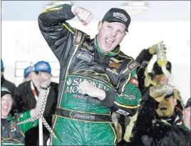 ?? CHUCK BURTON/ THE ASSOCIATED PRESS ?? Johnny Sauter celebrates after winning the truck series race Feb. 19 at Daytona Internatio­nal Speedway. Sauter, who drives for Maurice Gallagher of Las Vegas, is in the new bracket-style eliminatio­n races. Las Vegas Motor Speedway will host round two.