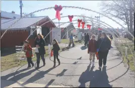  ??  ?? According to Brenda DiCarlo, director of the Southern Maryland Food Bank, more than 5,000 people attended the Kris Kringle Christmas Market on Dec. 9-10, donating more than 30,000 pounds of food to the food bank.