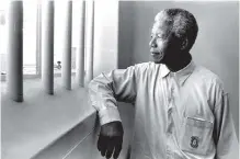  ?? JÜRGEN SCHADEBERG ?? NELSON Mandela revisits Robben Island. |