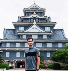  ??  ?? Settled in: hadi Fayyadh abdul razak stands in front of the Okayama Castle.