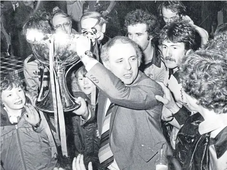  ??  ?? Former Dundee United manager Jim McLean and his players with the League Cup in 1979.