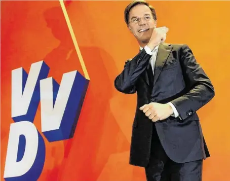  ?? BILD: SN/APA/AFP/JOHN THYS ?? Mark Rutte freut sich über den Wahlsieg, hat aber acht Sitze im Parlament verloren.