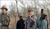  ??  ?? Au Bénin, JeanLuc, à droite, en compagnie de ses pisteurs et de son compère Bruno Roebroeck. Ci-dessus, panorama de la forêt congolaise.