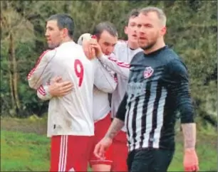  ?? Photo and match preview: Derek Black ?? Donald Campbell and Craig MacEwan congratula­te Willie Gemmell after he slots home Saints second goal against Yoker from the penalty spot to set up the quarter-final against Goldenhill.