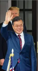  ?? OLIVIER DOULIERY / ABACA PRESS ?? U.S. President Donald Trump watches after welcoming the president of the South Korea, Moon Jae-in, during an arrival ceremony at White House last month in Washington, D.C. Trump wants to end joint military exercises between the countries.