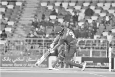  ?? - AFP photo ?? Afghan cricketer Hazratulla­h Zazai hits a shot during Afghanista­n’s Internatio­nal Twenty20 (T20) cricket match against Ireland in the northern Indian city of Dehradu.